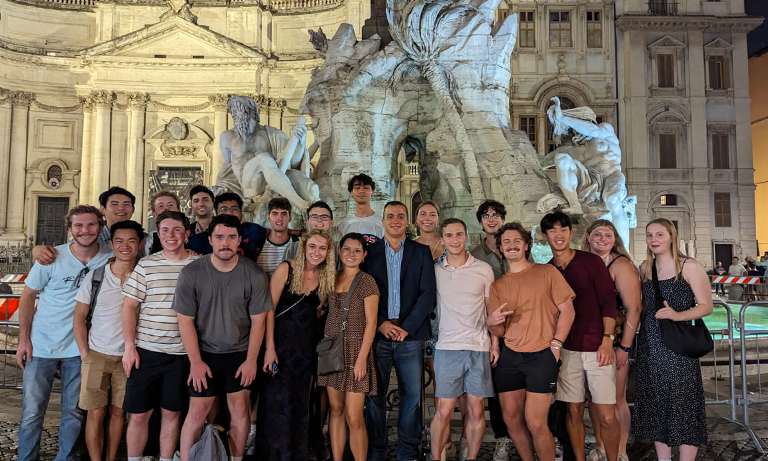 Students studying abroad in Rome gather for a group photo