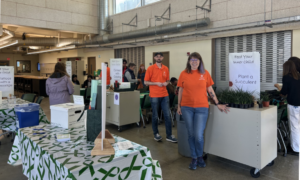 Two professors at a mental wellness fair event.