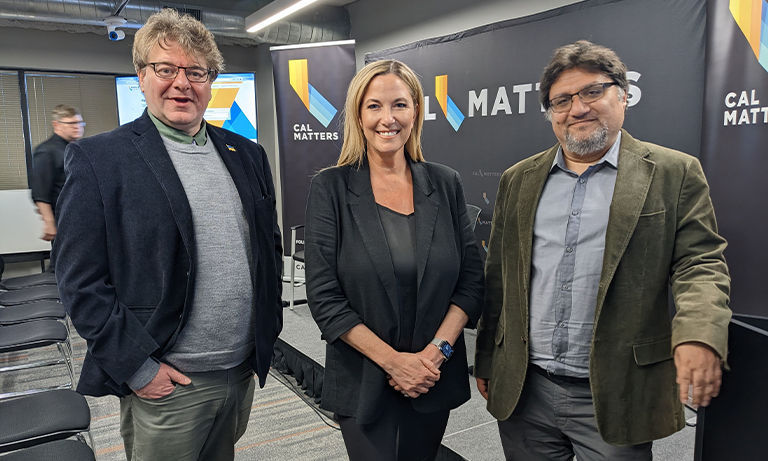 Group shot of 3 people involved with project