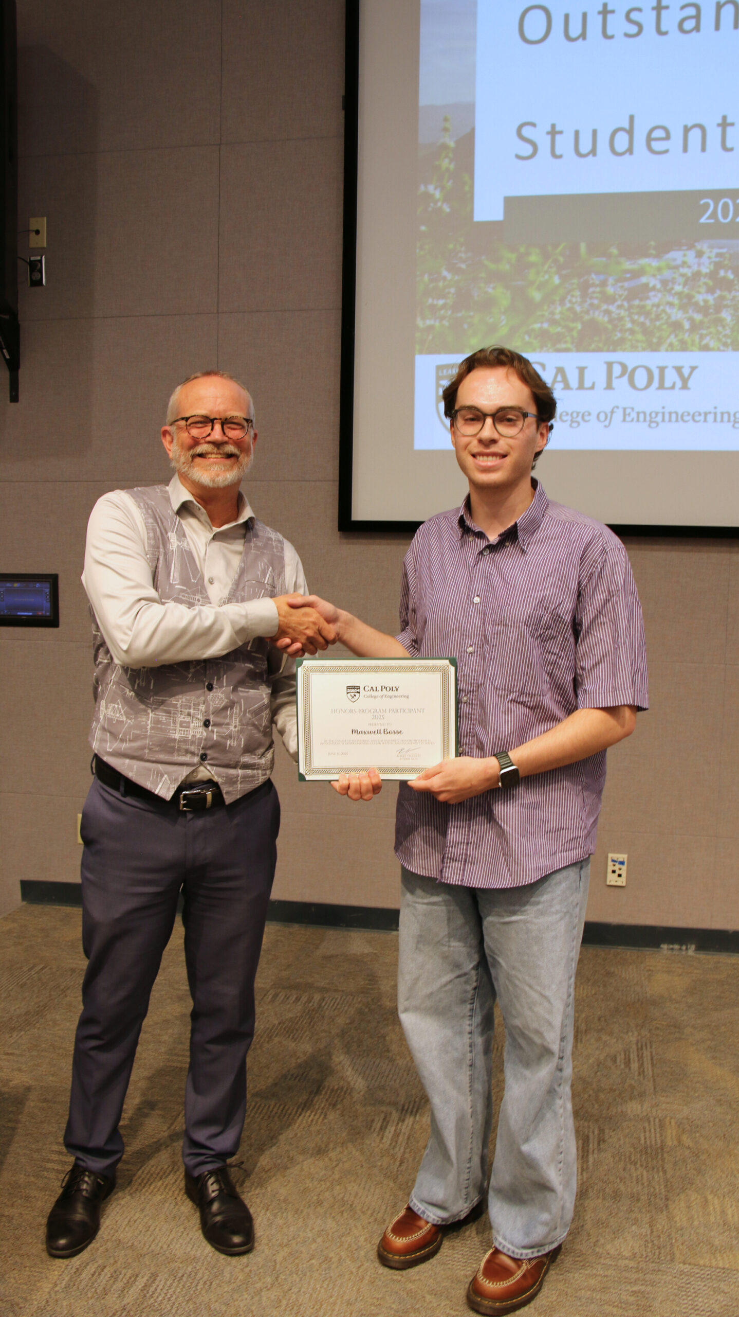 A student receiving an award