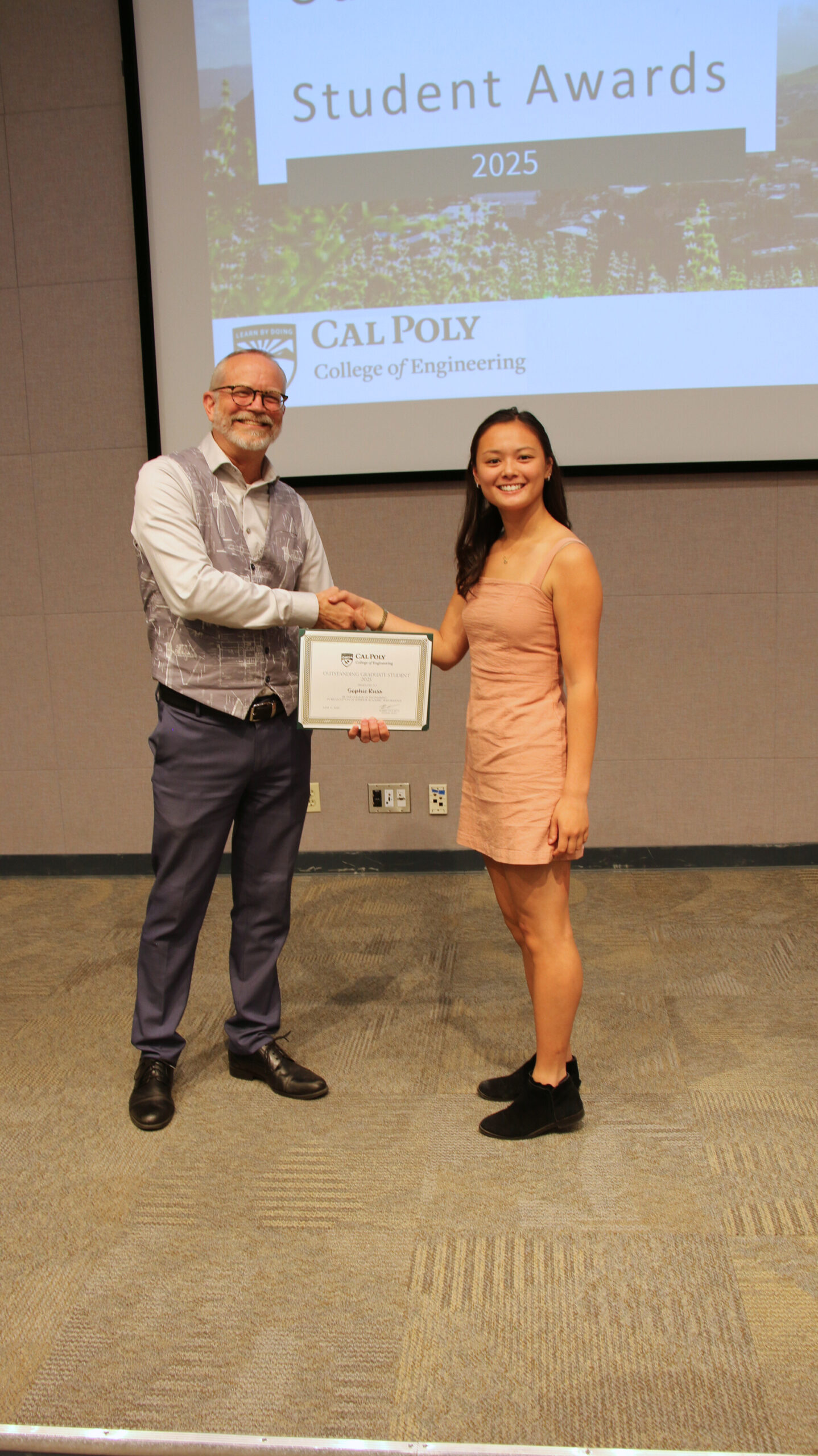 A student receiving an award