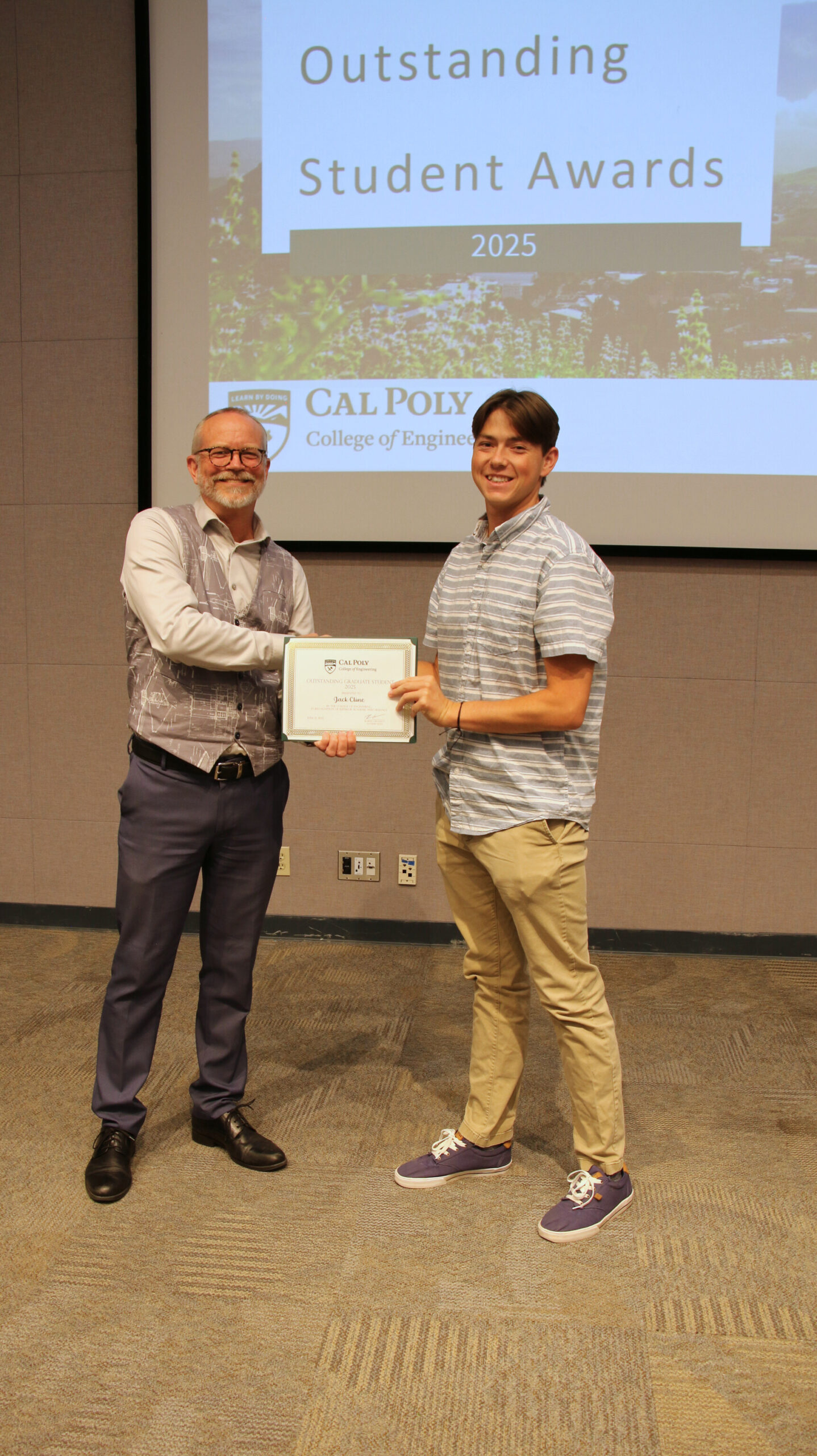 A student receiving an award