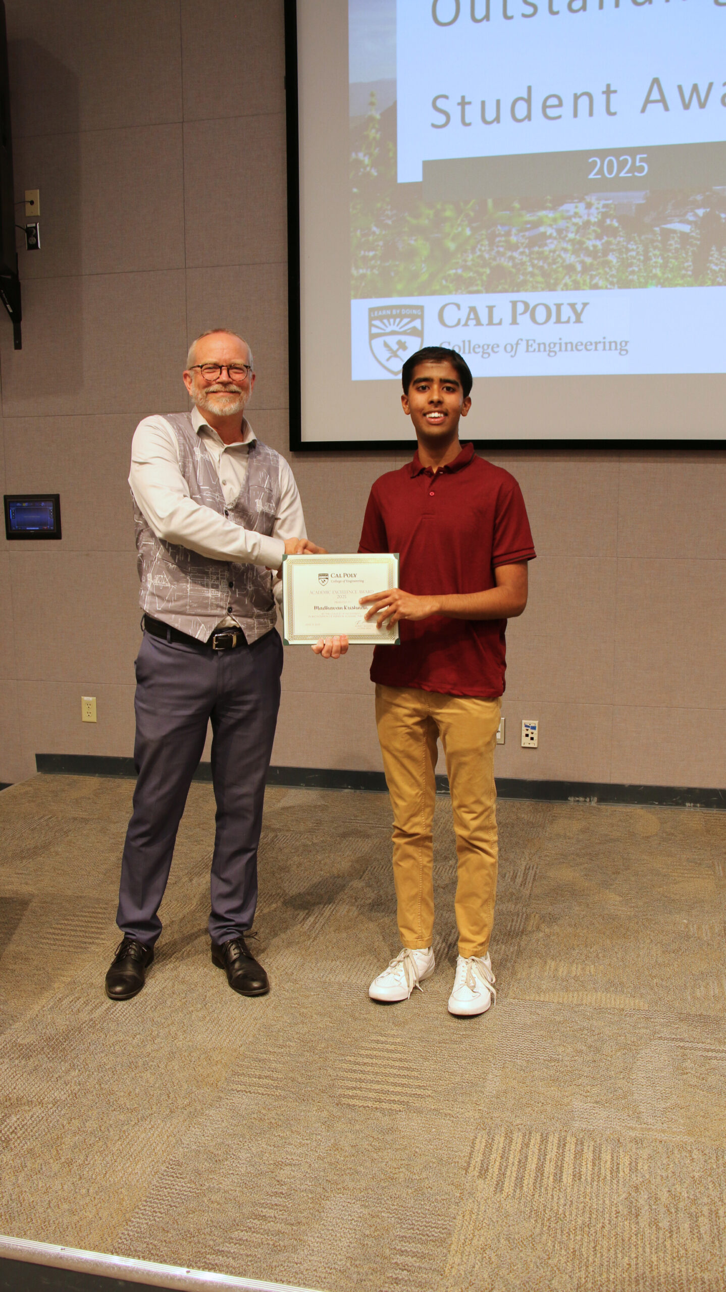 A student receiving an award