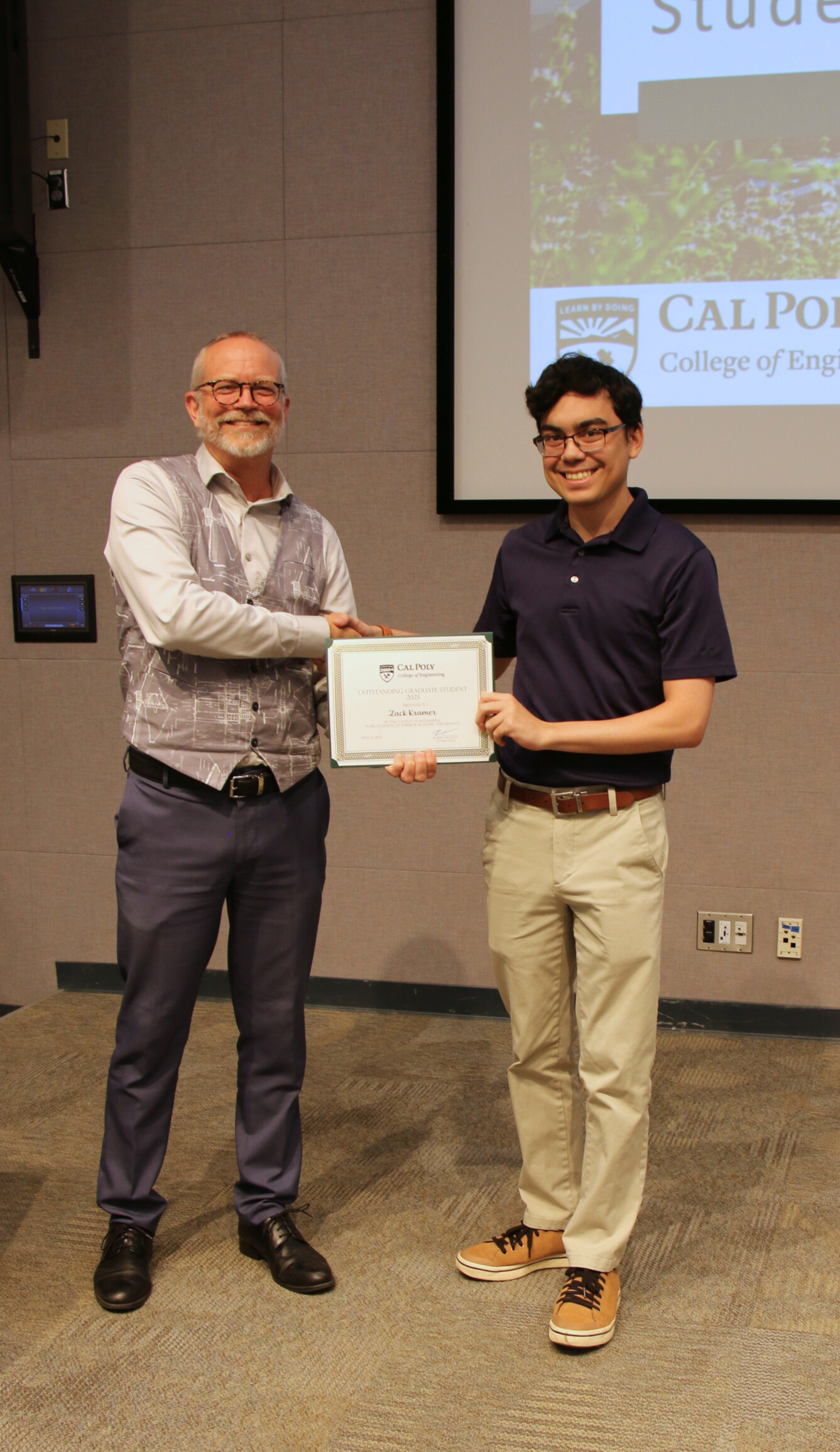 A student receiving an award