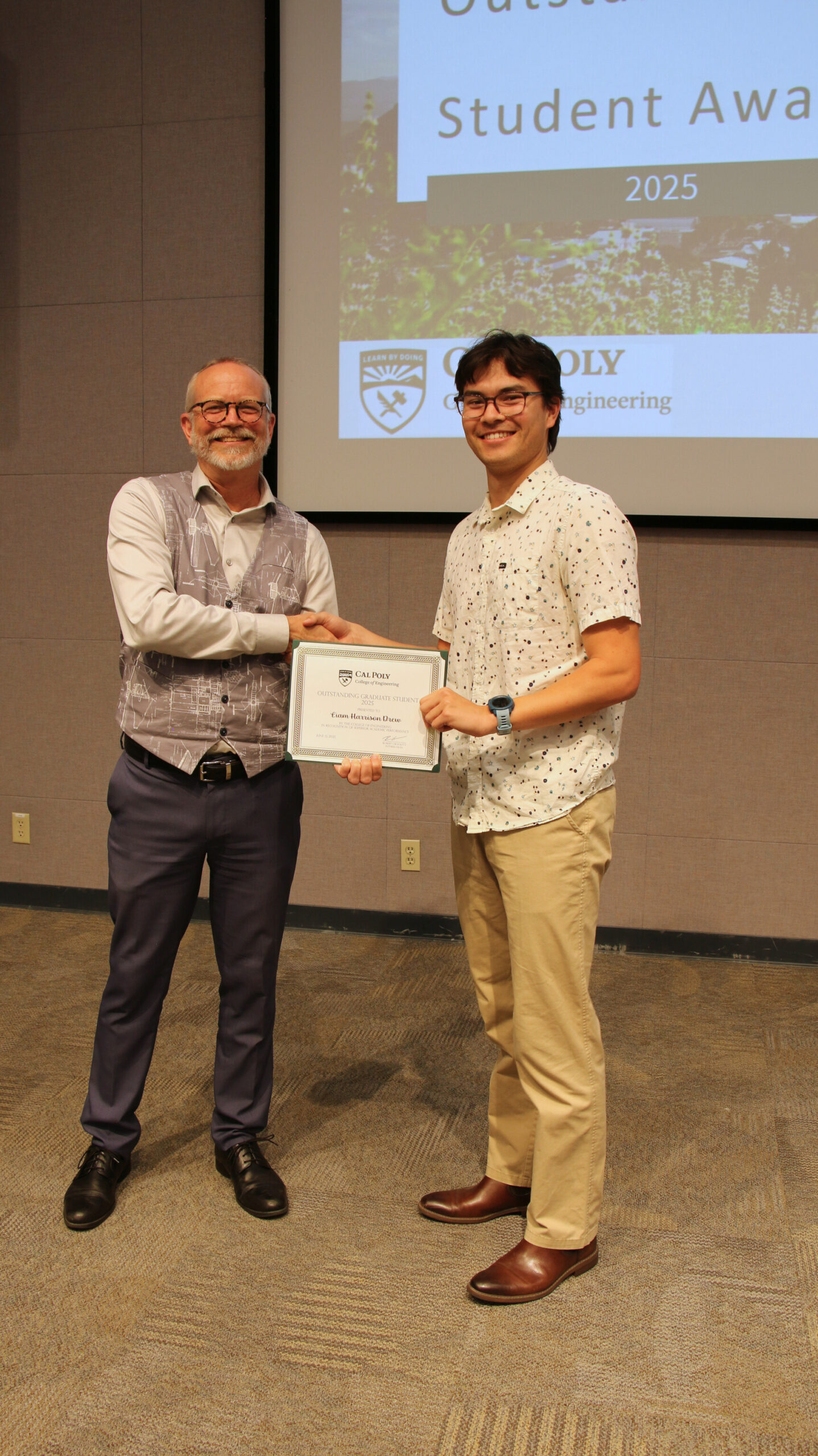 A student receiving an award