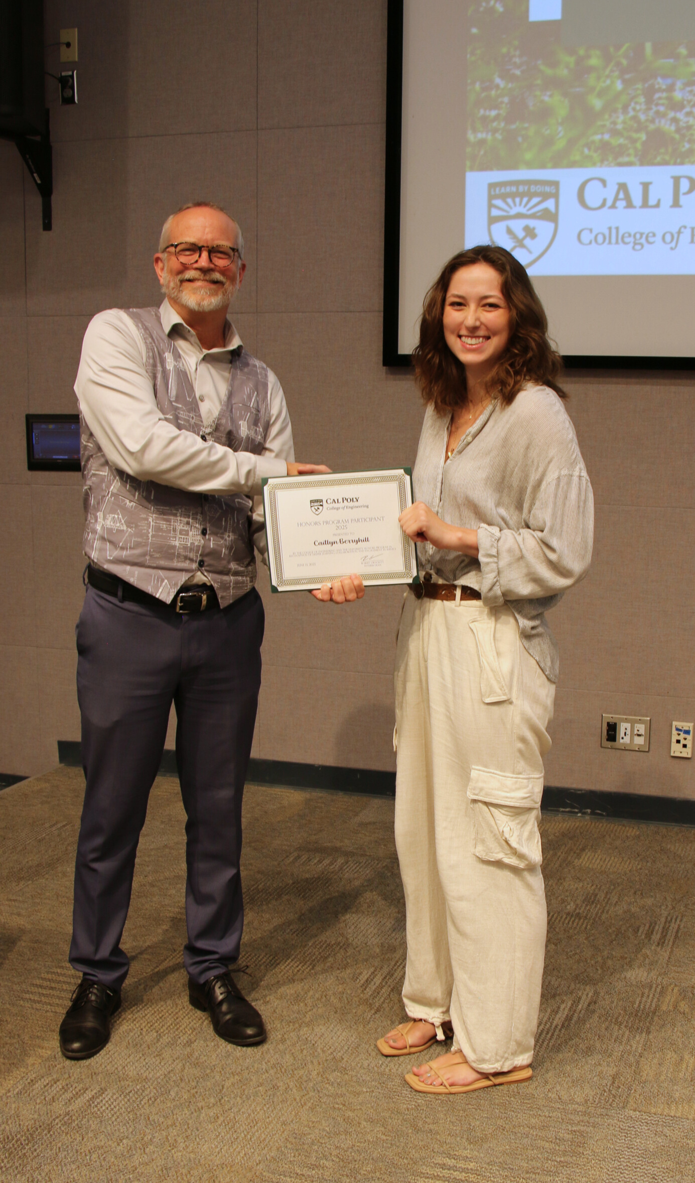 A student receiving an award