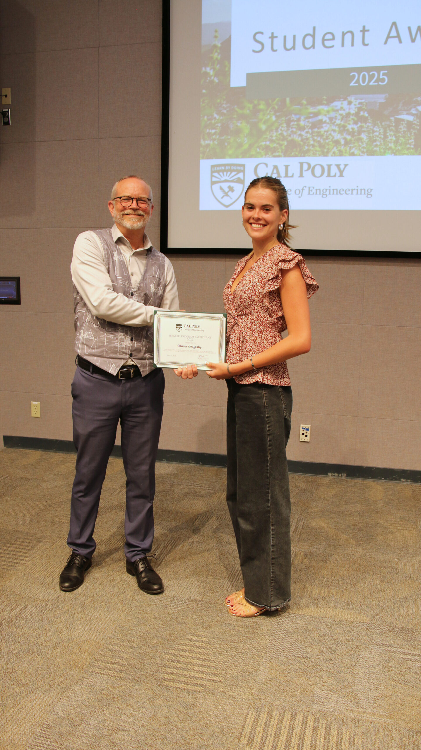 A student receiving an award