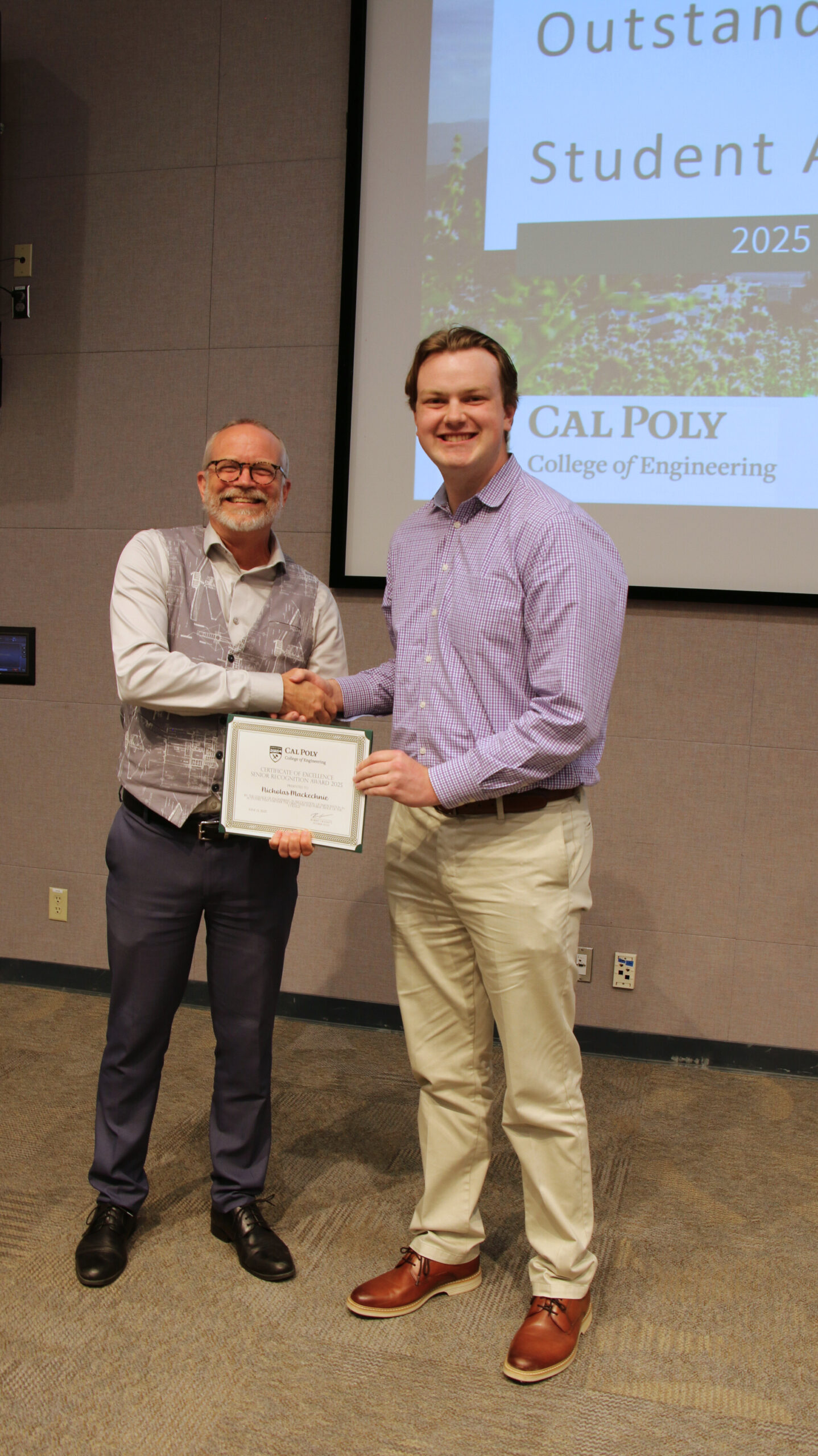 A student receiving an award