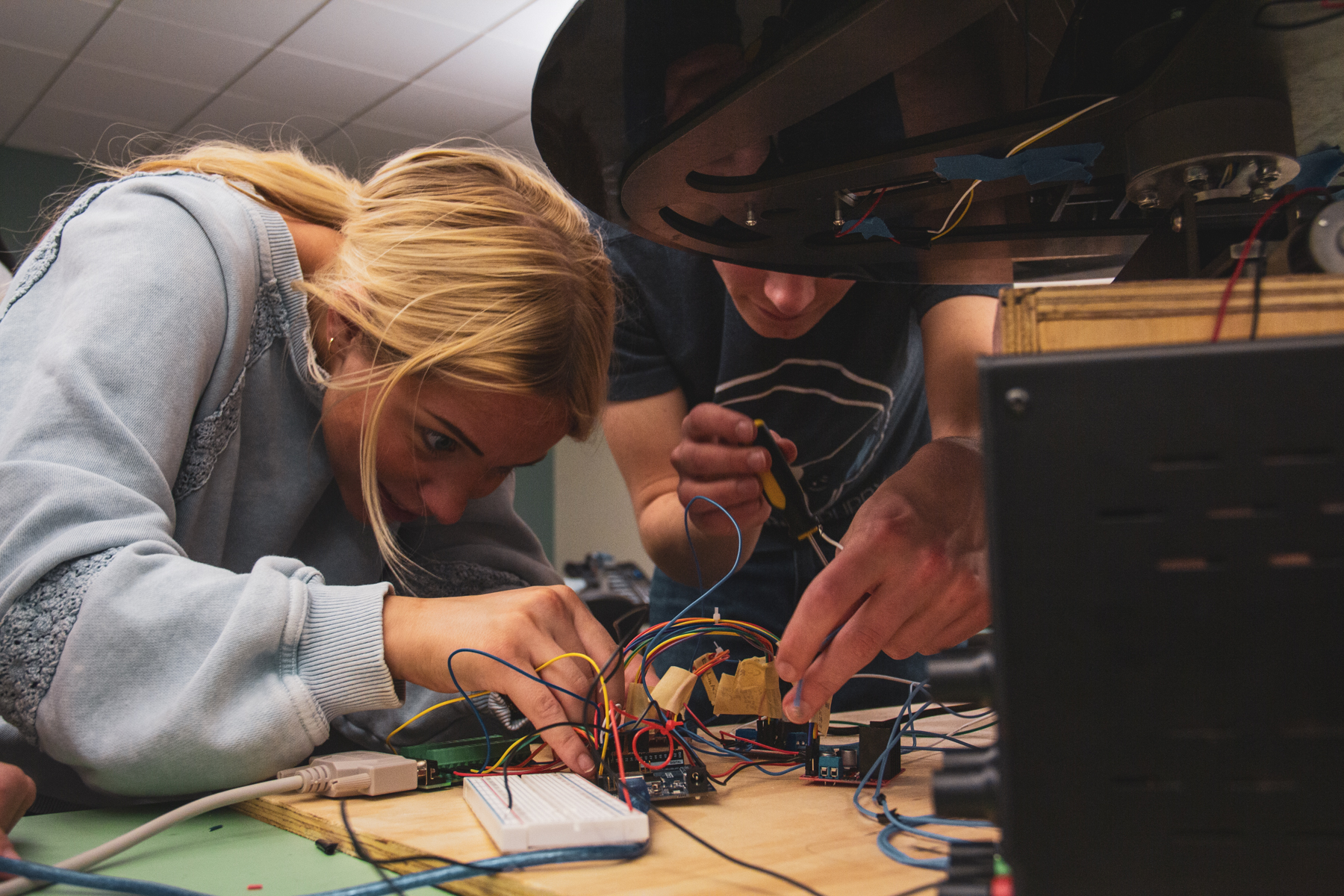 Student works on wiring a themed ride entry