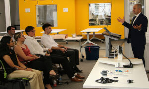 Professor talks to group of students