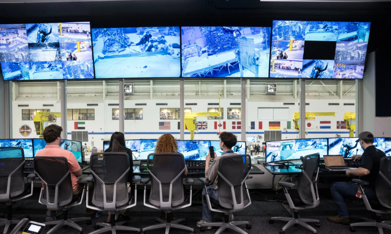 Students watching monitors at NASA