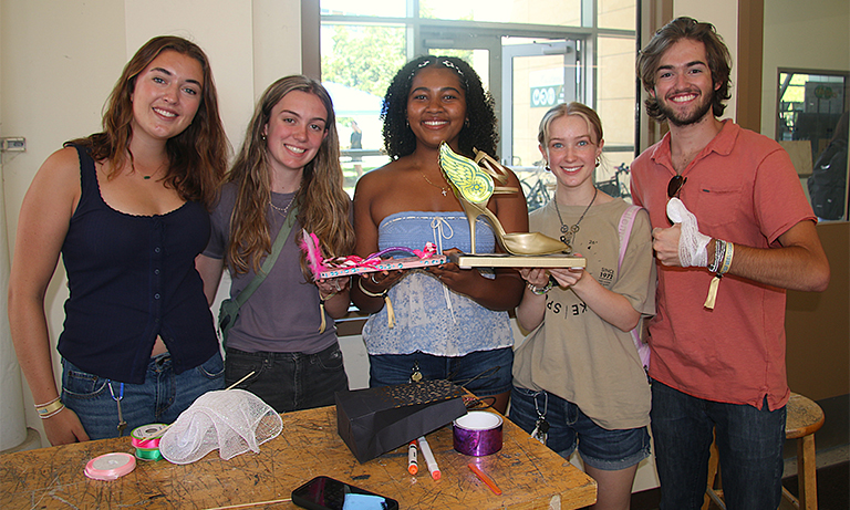 Students hold winning shoe design