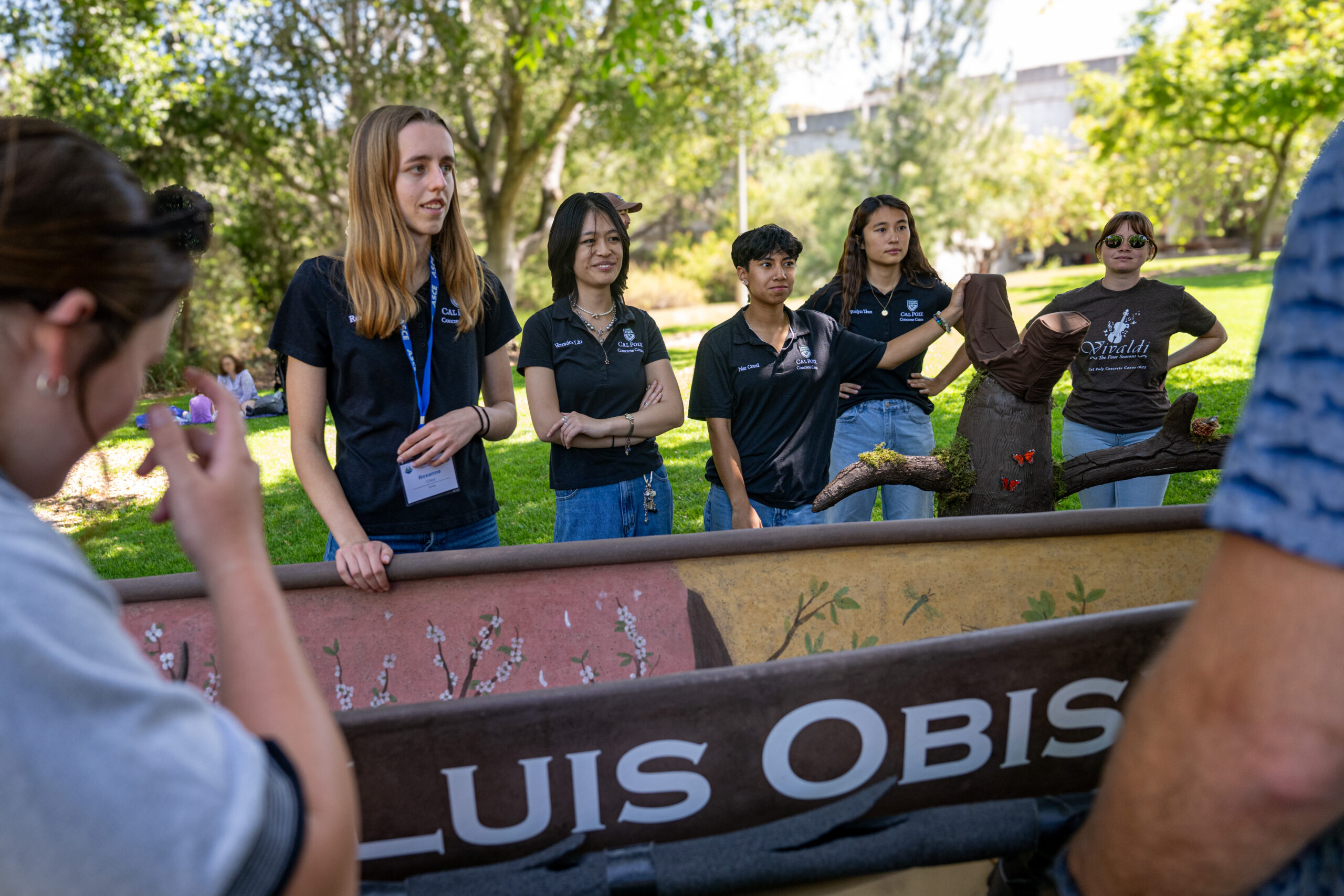 Students display their concrete canoe ahead of race day