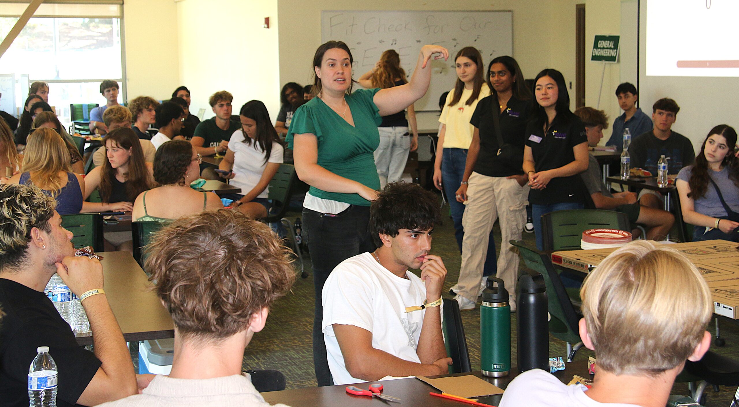 Professor directs students during the Week of Welcome event