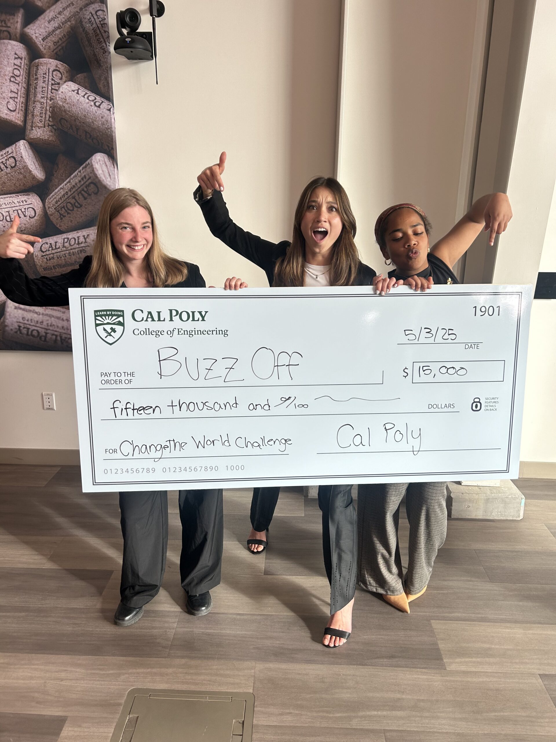 Students celebrate win with big check