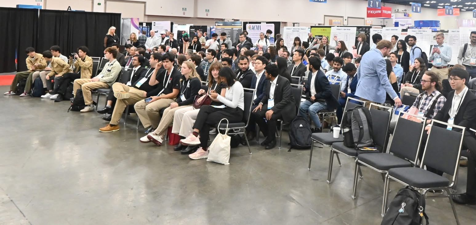 Candid shot captures crowd at conference