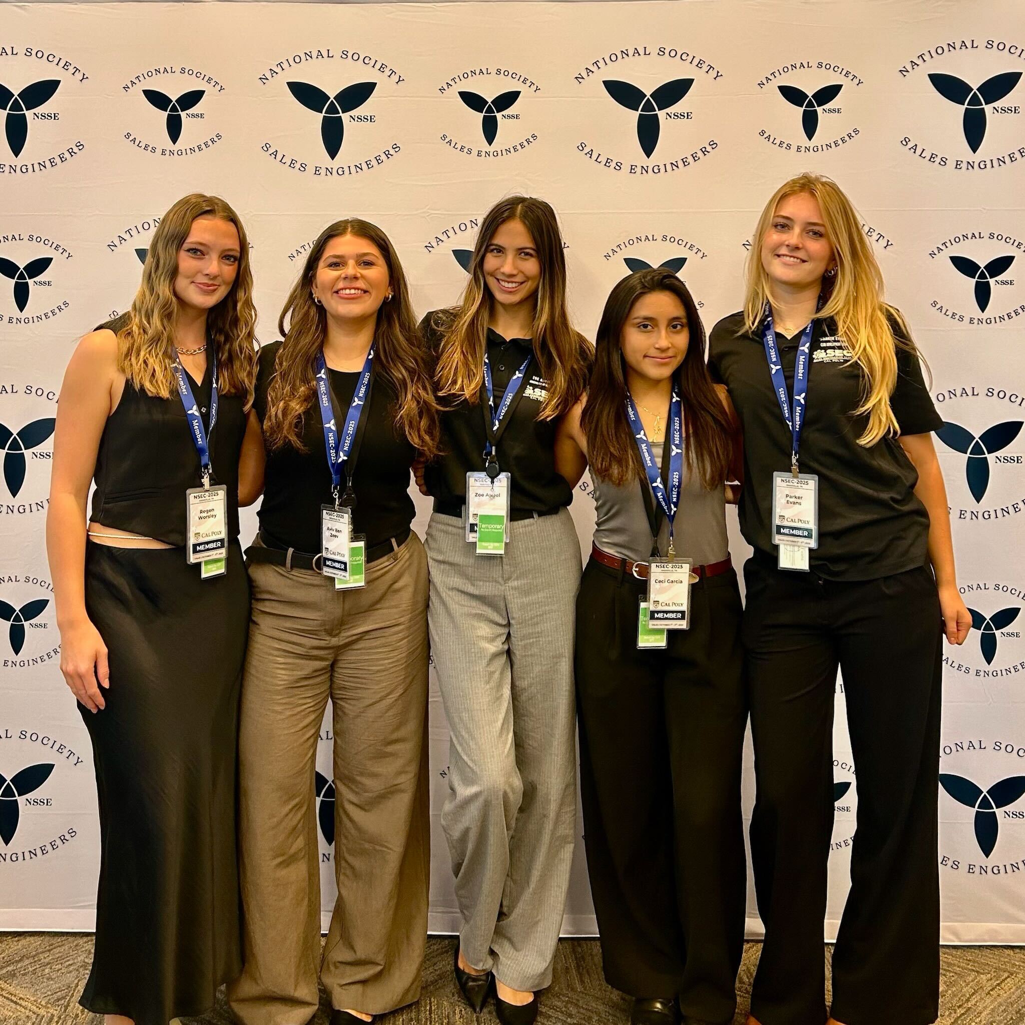 Group of women pose at competition