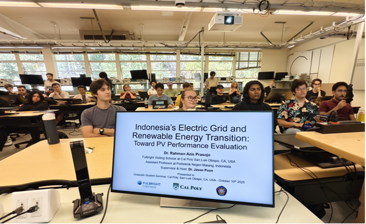 Graduate students listen to presentation in classroom