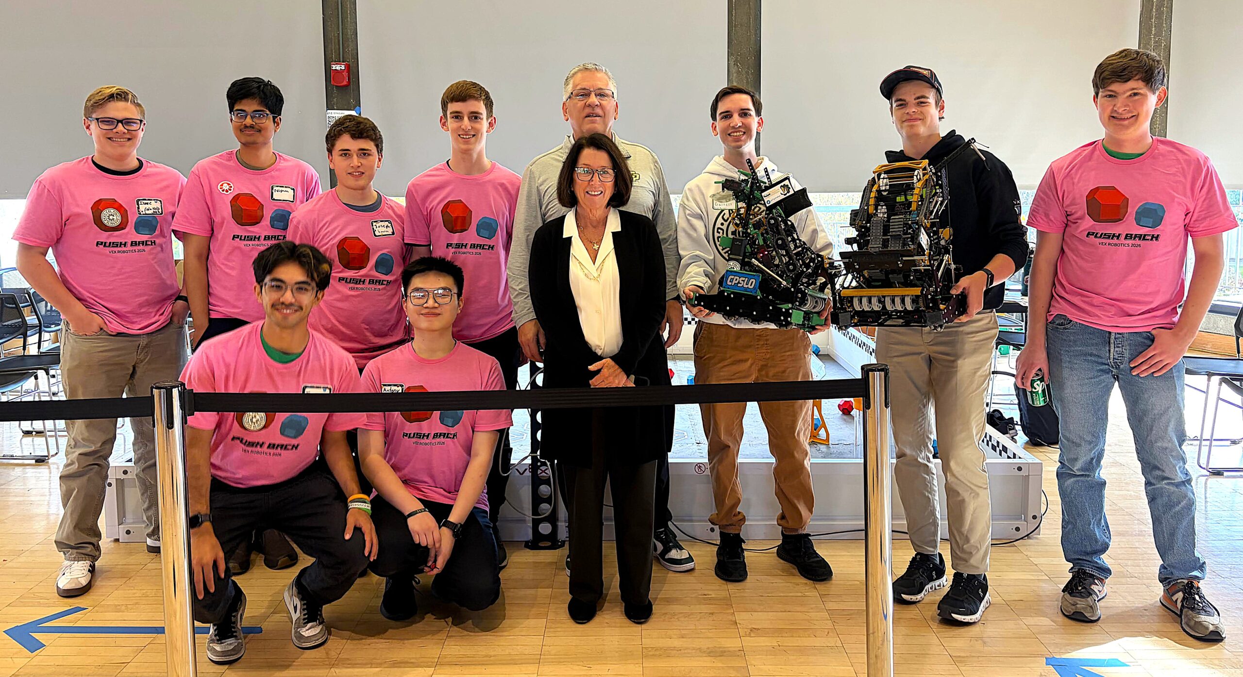 Cal Poly president and wife meet with the Gear Slingers during the competition
