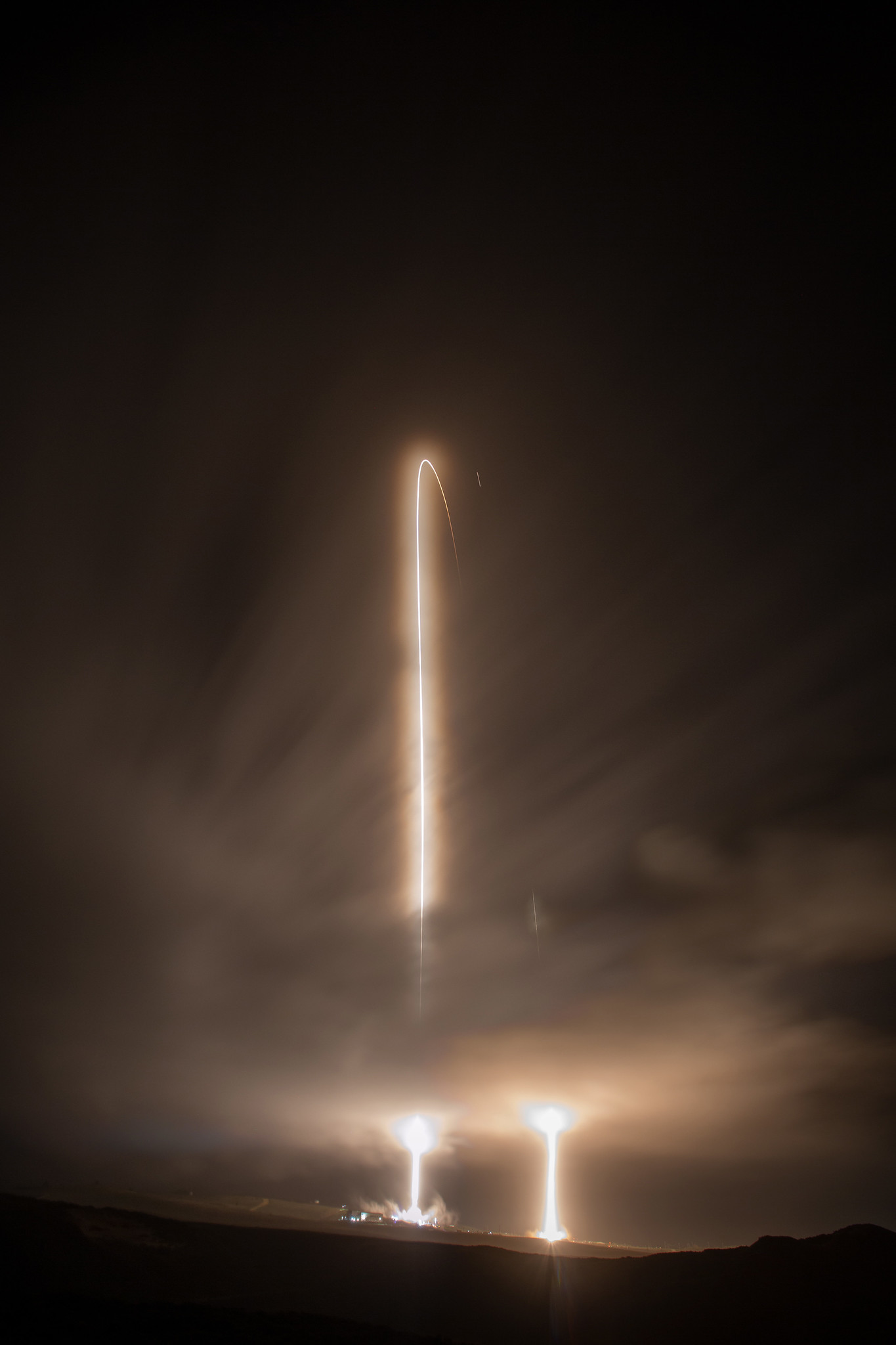Rocket arcs across the sky