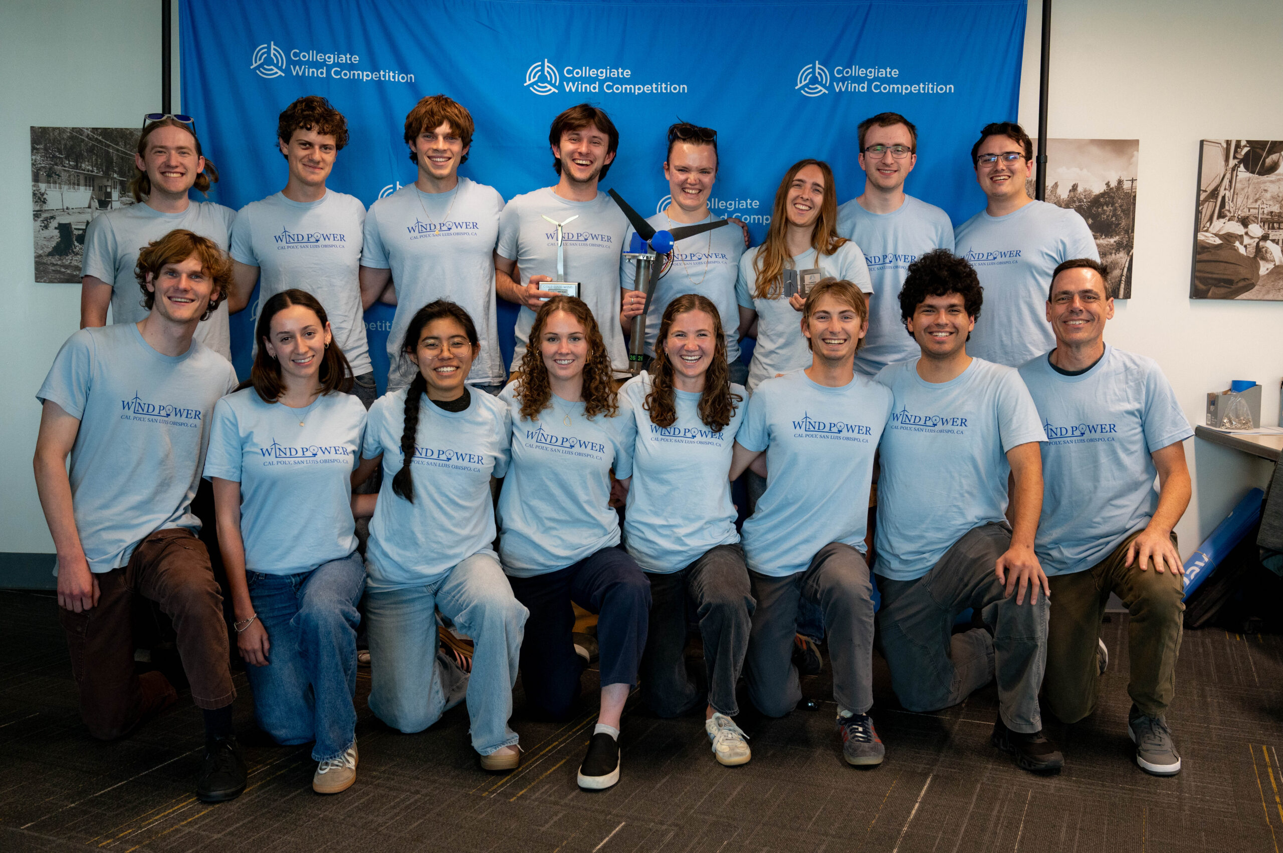 Group poses with trophies