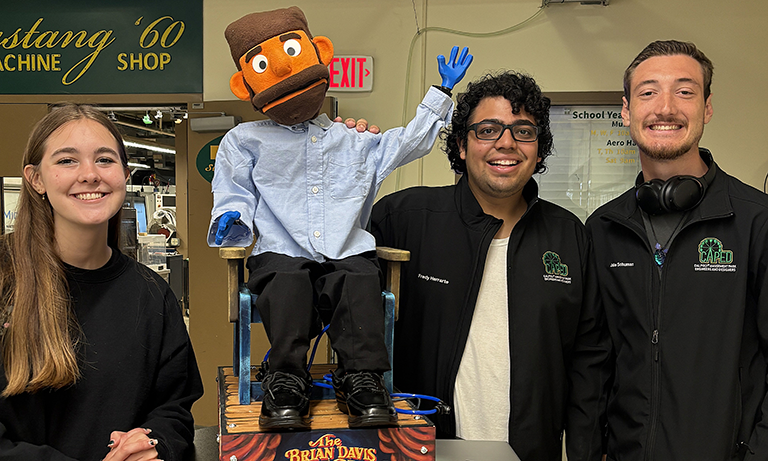 Group stands with puppet